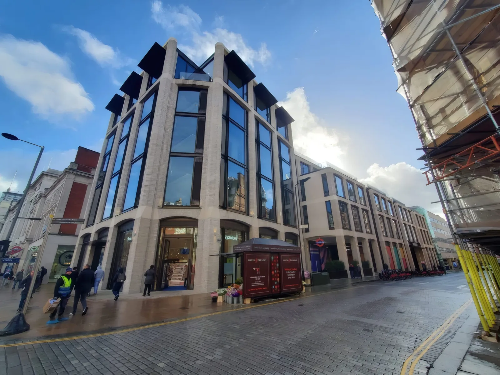 The completed corner elevation, viewed from the street.