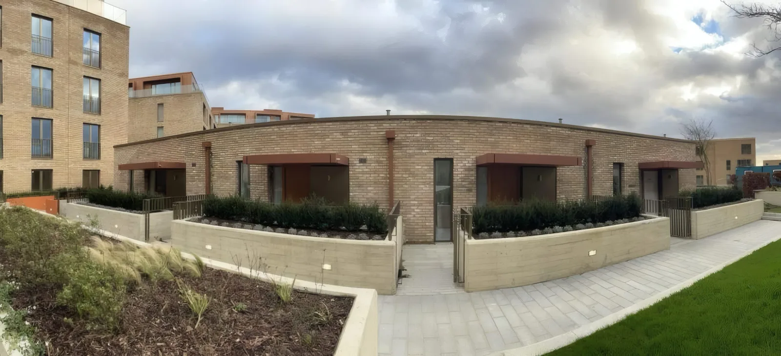 The completed townhouse block within the development’s landscaped courtyard.