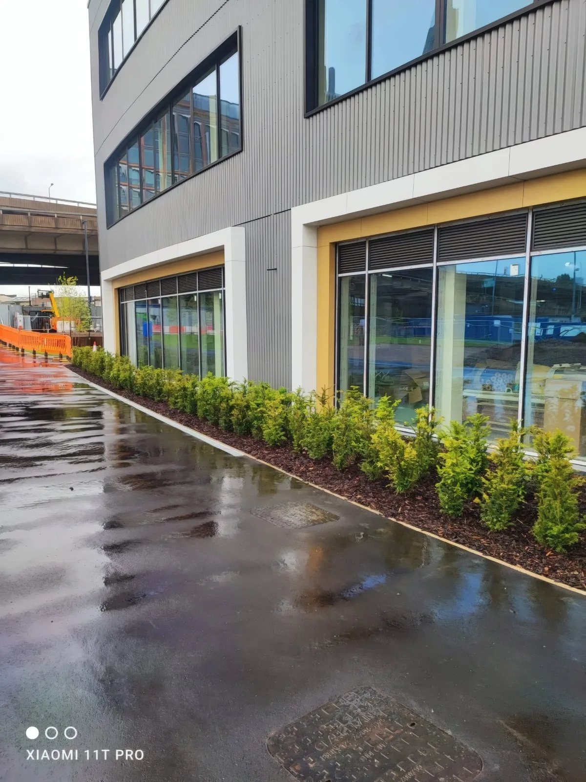 Ground-floor glazing along the side of the building.